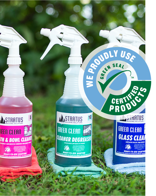 Three Bottles of Stratus Cleaning Products with a "We Proudly Use Green Seal Certified Products” Logo Overlaid on the Image
